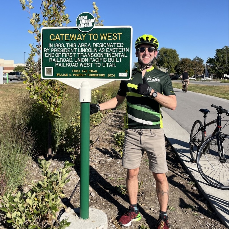 RTC's Kevin Belle at the First Ave Trail Great American Rail-Trail historical marker | Photo courtesy RTC