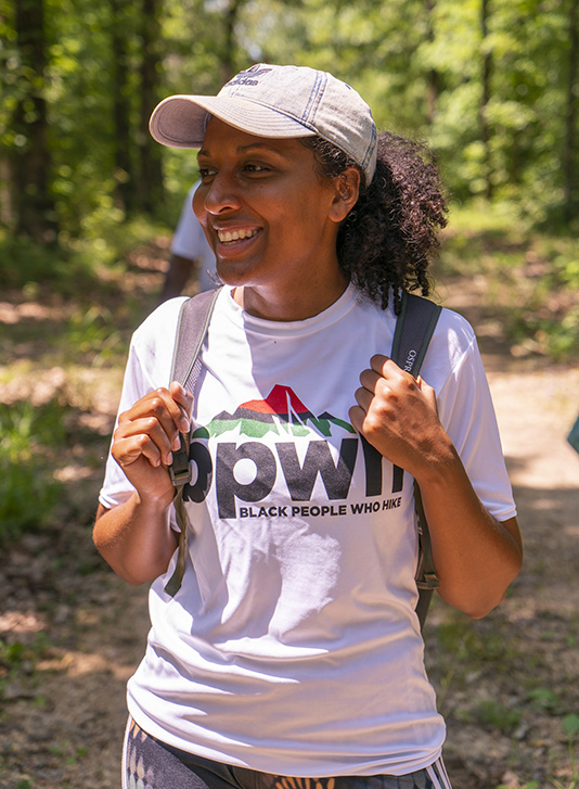 Debbie Njai walking on trail | Photo courtesy Black People Who Hike