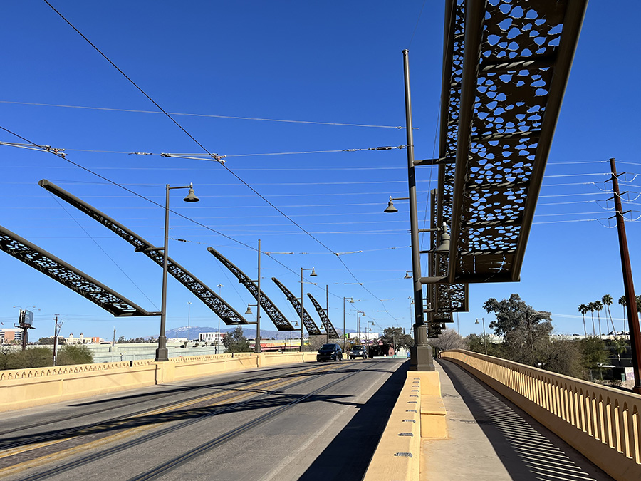 Numerous artworks are displayed along the nearly 42-mile Santa Cruz River Park Trail, including the series of panels that soar over the Luis G. Gutierrez Bridge at Cushing Street. | Photo by Cindy Barks