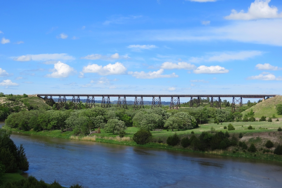 The Cowboy Trail offers some of Nebraska’s best scenery: native prairie, grass-covered dunes and lush river valleys. It traverses more than 200 bridges, including the stunning Niobrara River Valley crossing. Photo by Eric Foster.