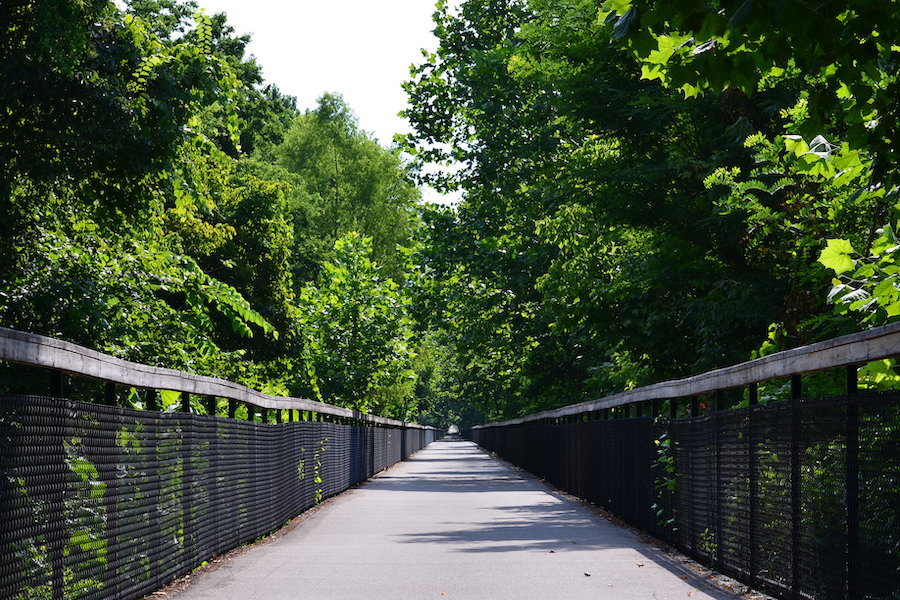 Memphis’ Shelby Farms Greenline unfurls under a canopy of oaks and other shade trees, and is dotted with bridges over scenic wetland and riparian areas. A highlight is the 4,500-acre Shelby Farms Park. Photo courtesy Shelby Farms Park Conservancy.