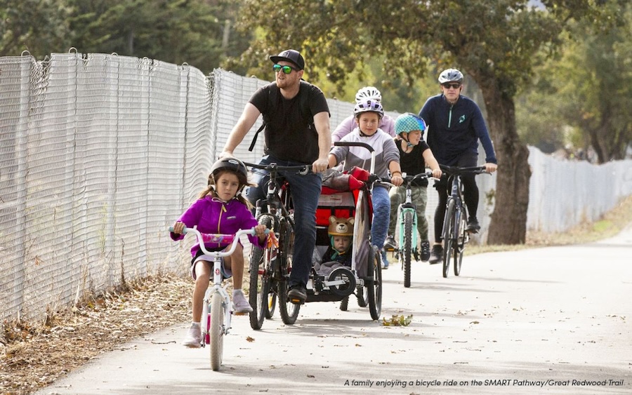 People enjoying a bicycle ride on the SMART Pathway/Great Redwood Trail